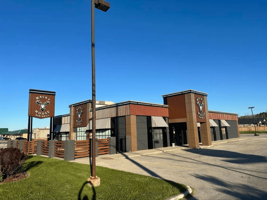 Wacky Moose Bar & Grill building corner with pylon and building signage