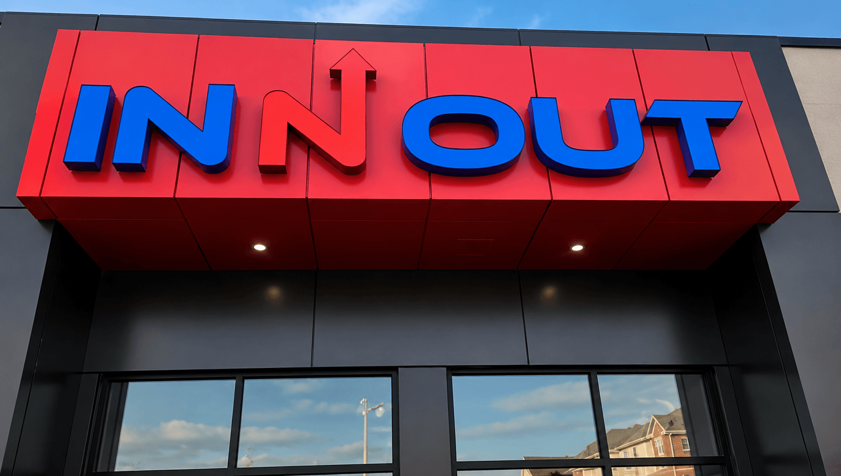 In N' Out channel letter sign detail on red ACM panel